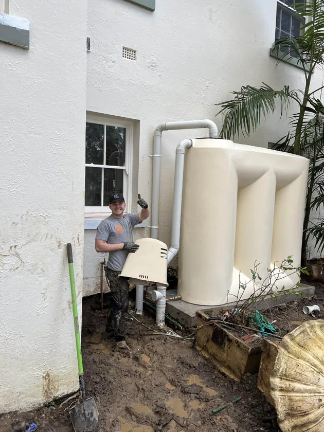 Overflow and drainage connections at a rainwater tank
